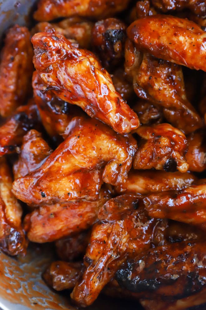 Bowl of chicken wings with sauce image
