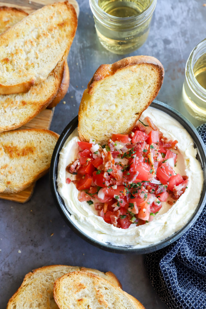 Bowl with whipped goat cheese salsa dip