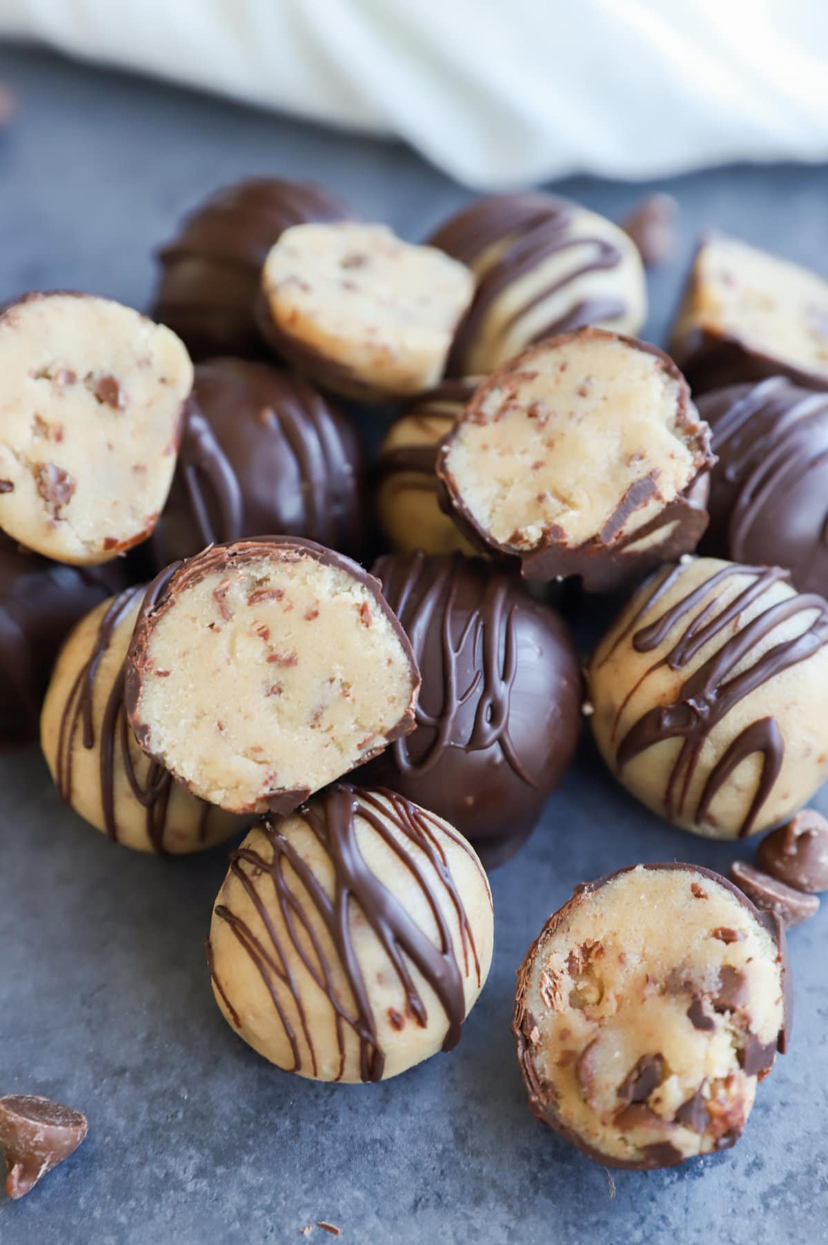 Cookie Dough Bites in a pile with chocolate chips picture