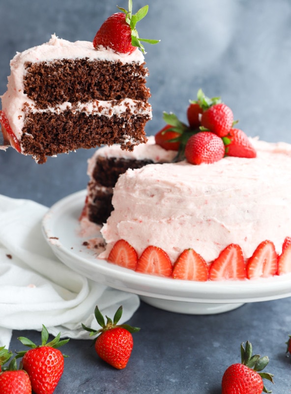 Picture of lifting out a slice of chocolate strawberry cake