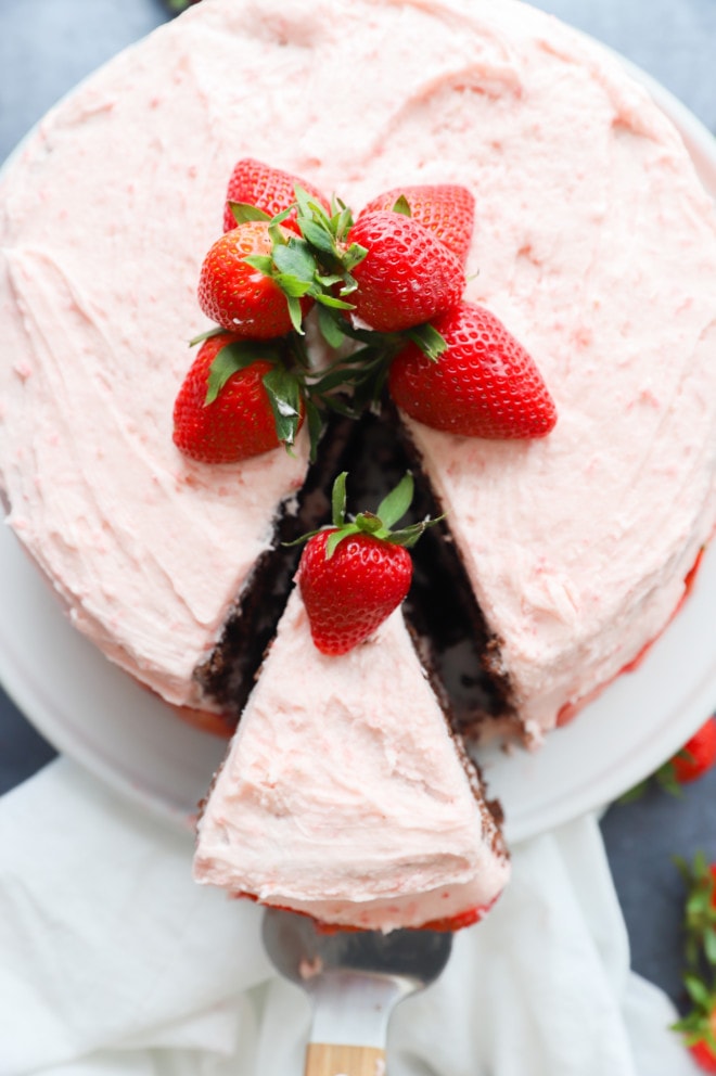 Cake slice being pulled out with cake knife image