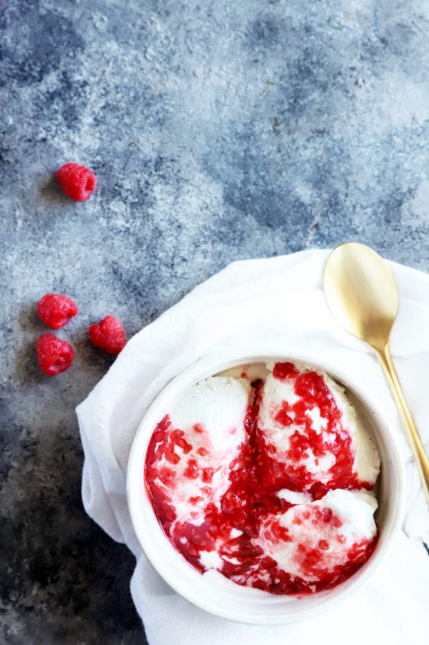 Overhead photo of raspberry sauce on ice cream