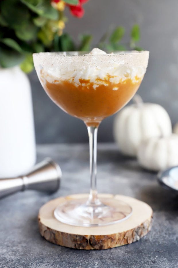 Side photo of pumpkin martini with pumpkins