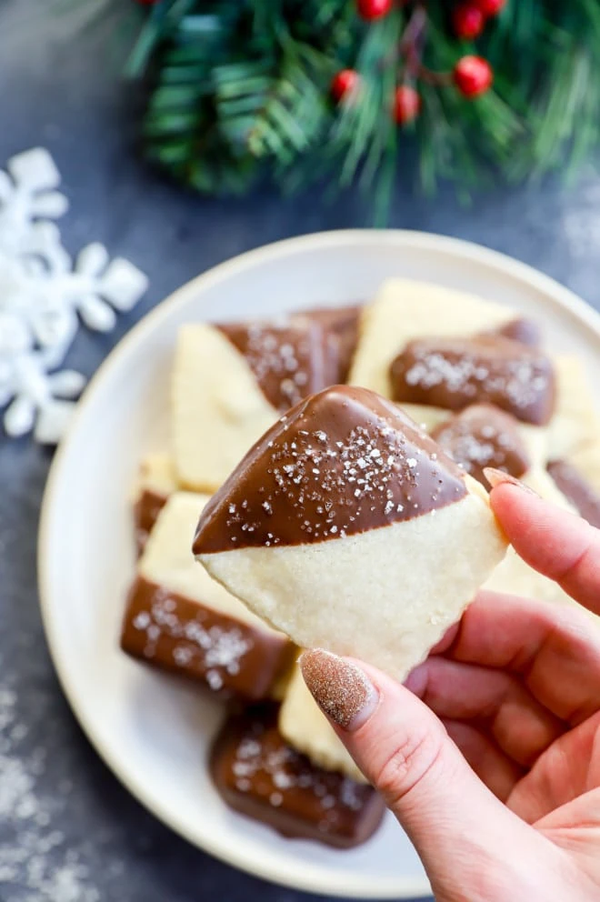Easy holiday cookies sprinkled with salt and dipped in chocolate