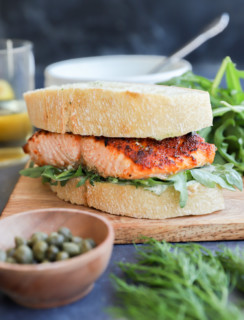 salmon sandwich recipe photo on platter with salad