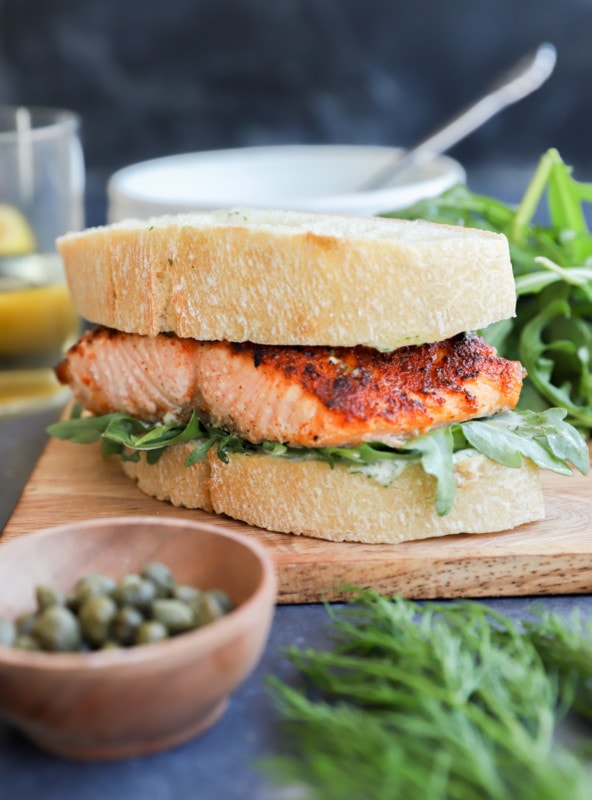 salmon sandwich recipe photo on platter with salad