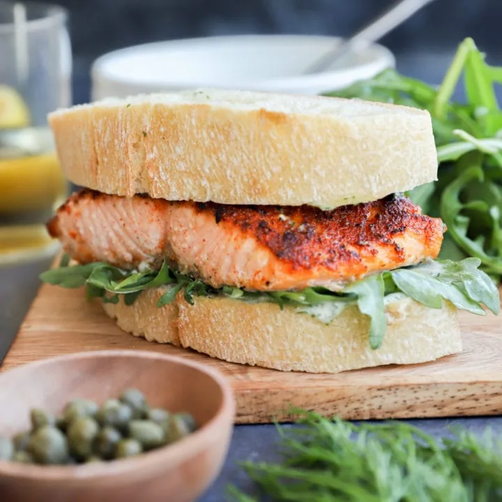 salmon sandwich recipe photo on platter with salad