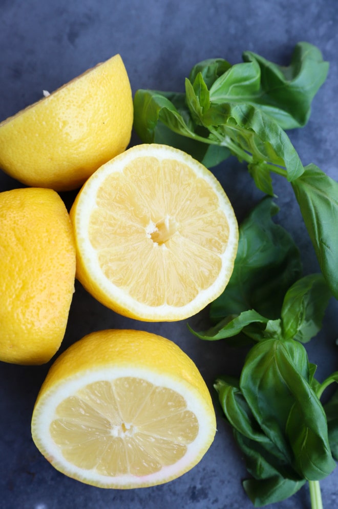 Lemon halves and basil leaves image ingredients