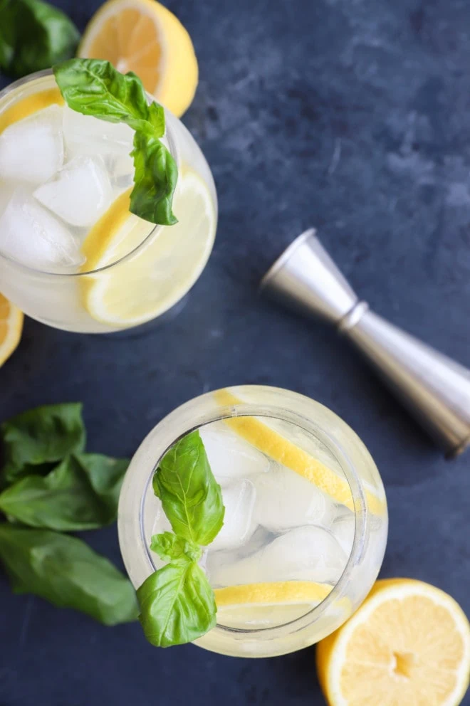 Overhead image of lemon basil cooler cocktails in glasses