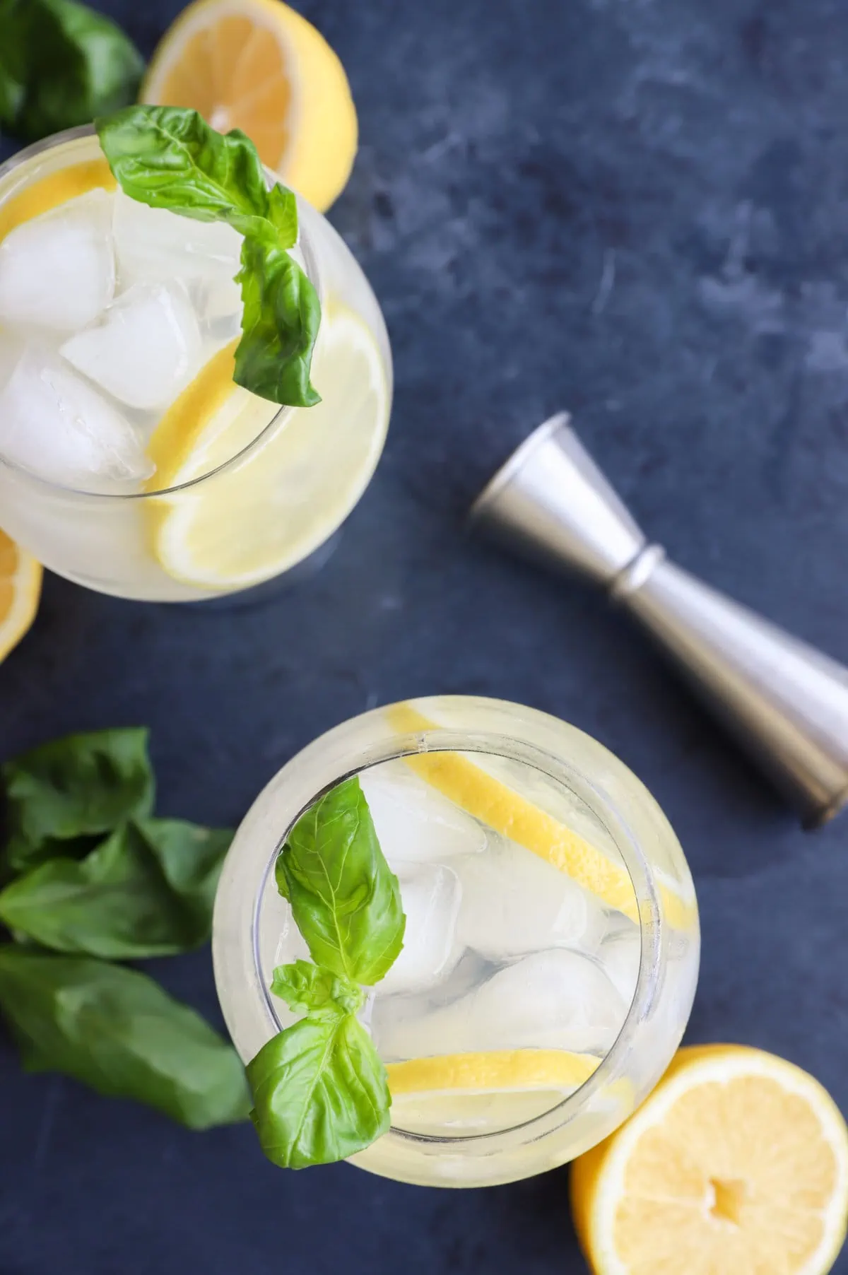 Overhead image of lemon basil cooler cocktails in glasses
