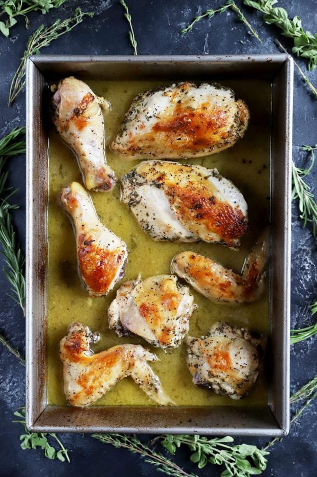 overhead shot of roasted chicken in pan