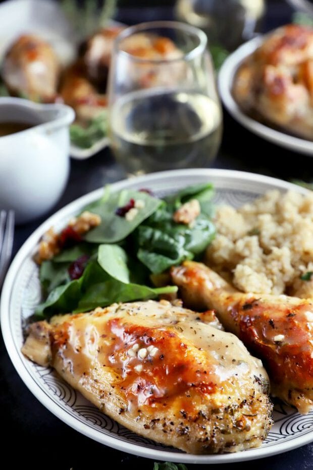 Chicken dinner on a plate with salad