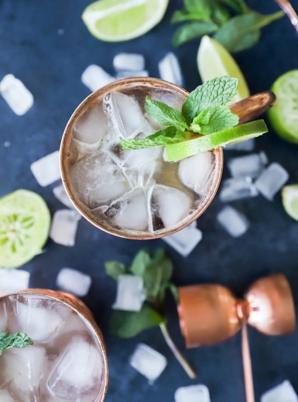 Overhead image of bourbon mule in copper mugs