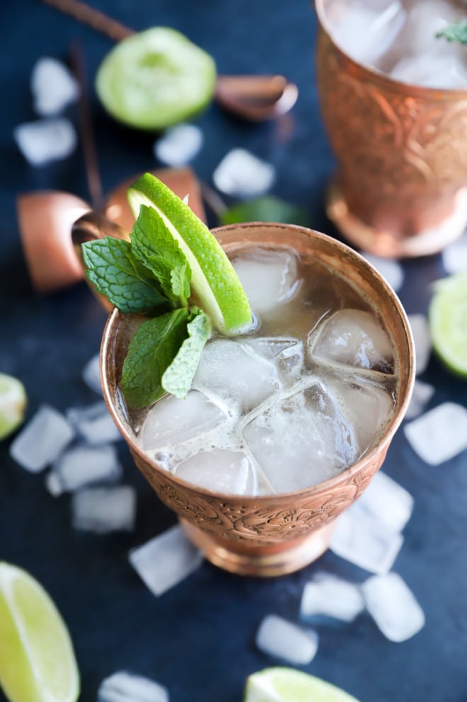 A kentucky mule in a copper mug with lime and mint