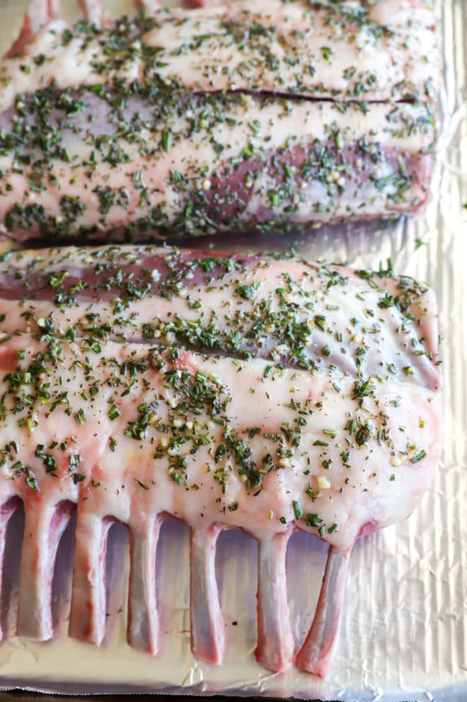 Rack of lamb ready to cook on sheet pan image