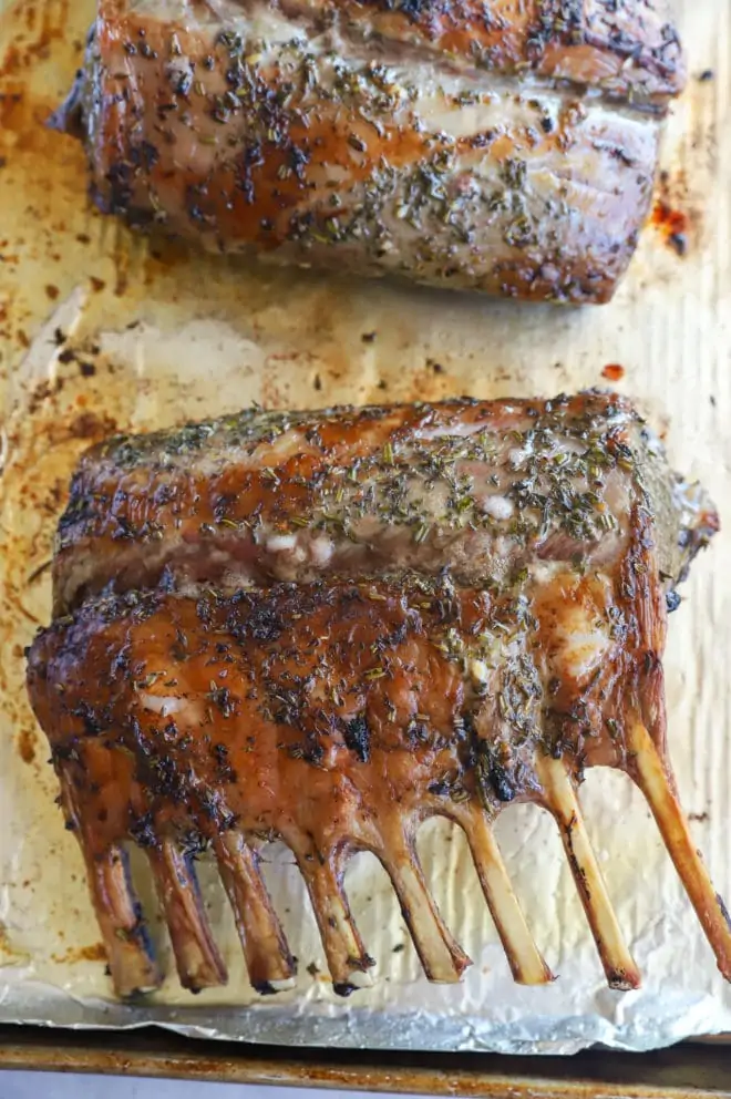 Lamb racks on baking sheet image