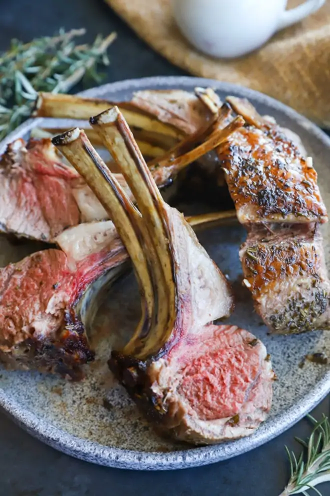 Herb crusted rack of lamb on plate picture