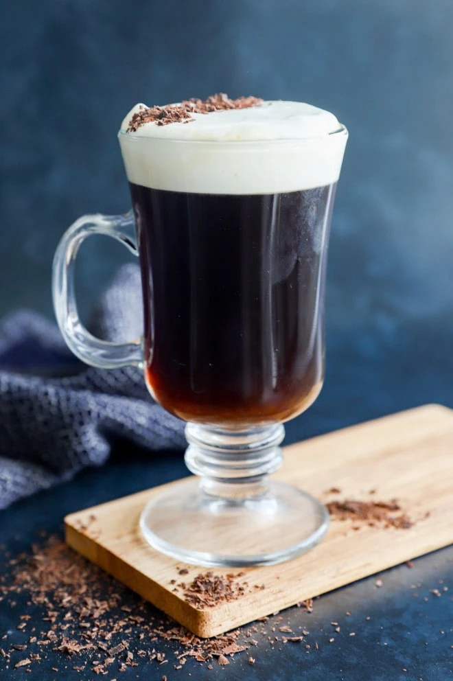 classic hot cocktail with whipped cream topping