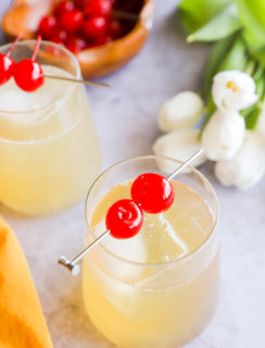 Cherries on cocktail glasses image