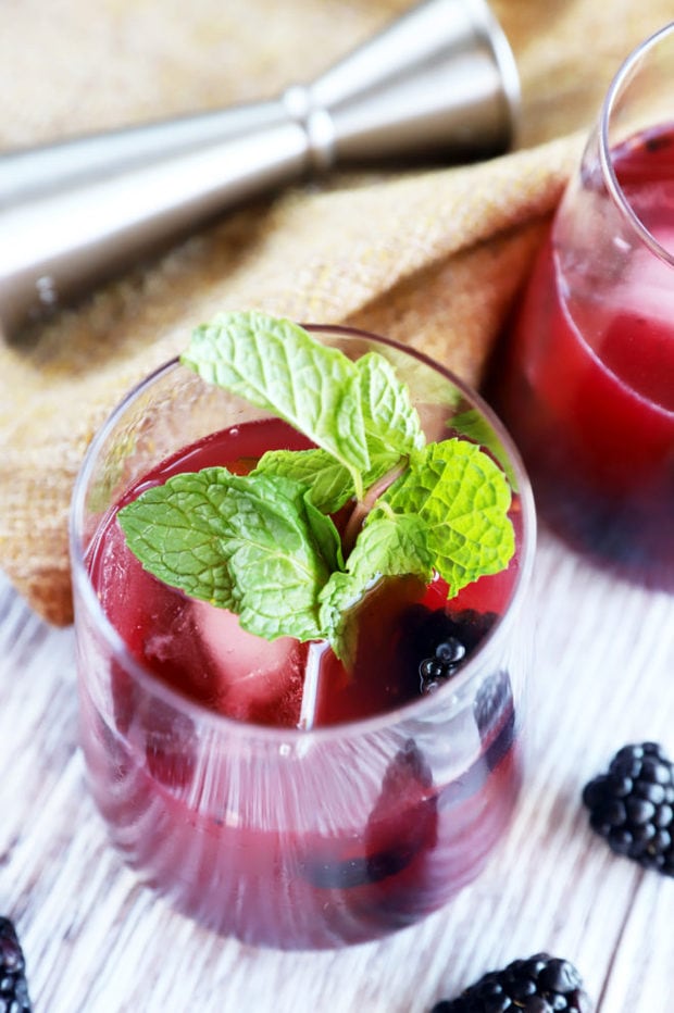 Summer cocktail with blackberries and mint