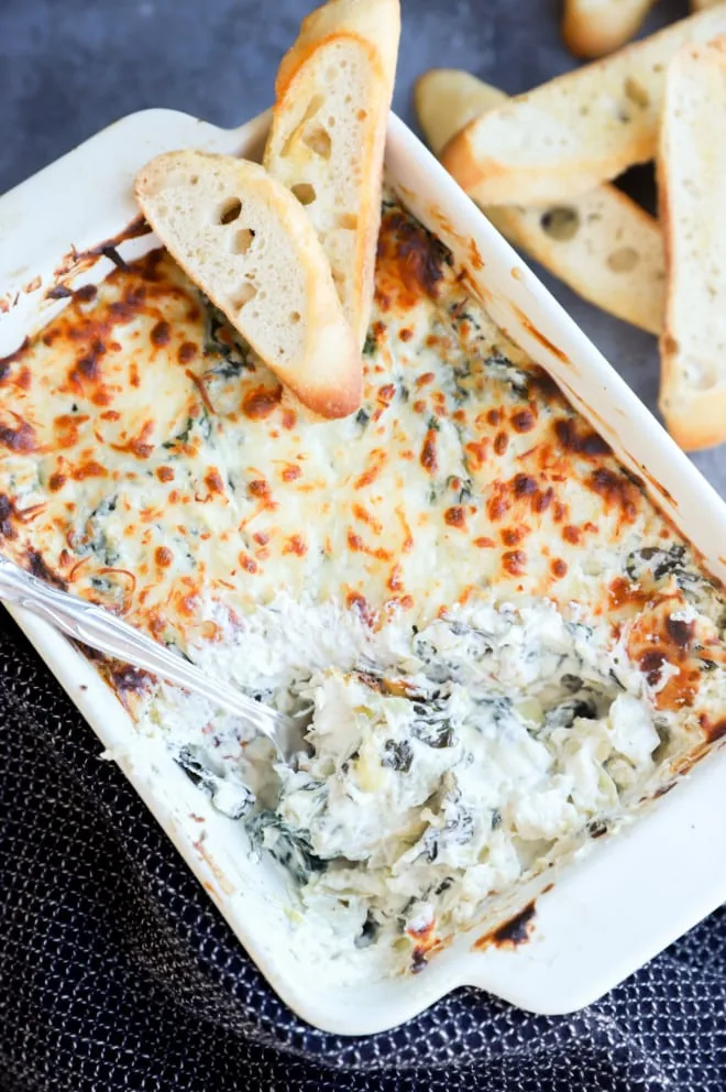 Overhead image of spinach artichoke goat cheese dip