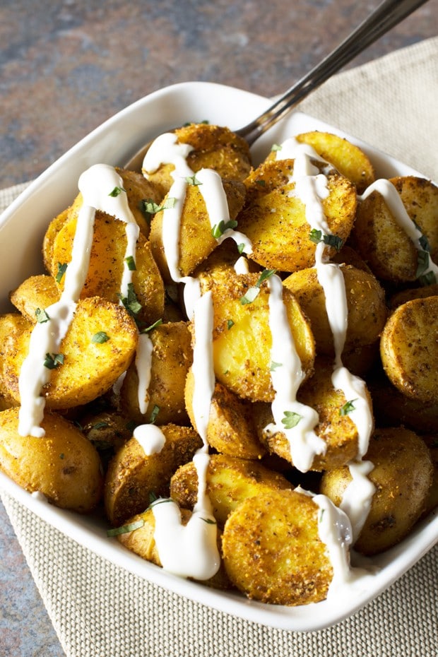 Roasted Curry Potatoes with Greek Yogurt Sauce | cakenknife.com