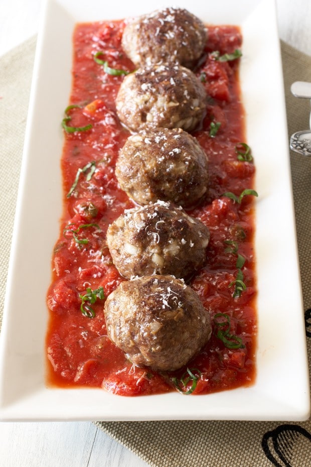Three Cheese Stuffed Meatballs with Tomato Basil Sauce | cakenknife.com