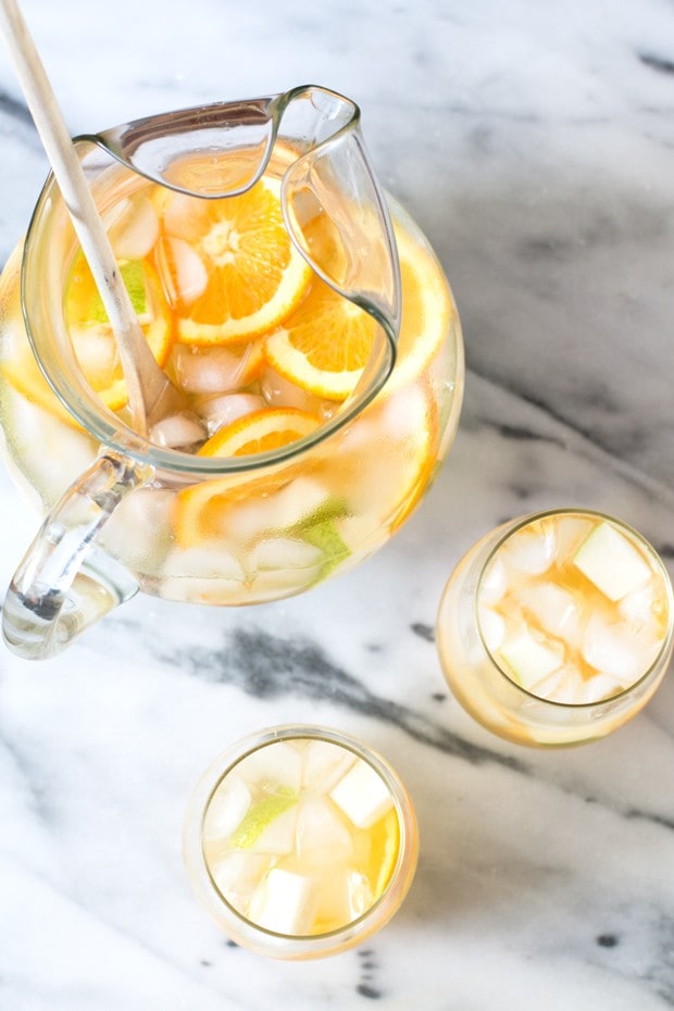 Summer white sangria with oranges and pears