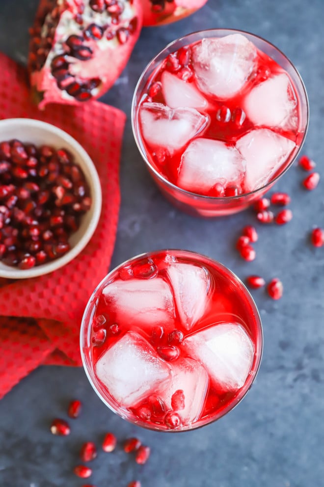 pomegranate negroni cocktail glasses with pomegranate