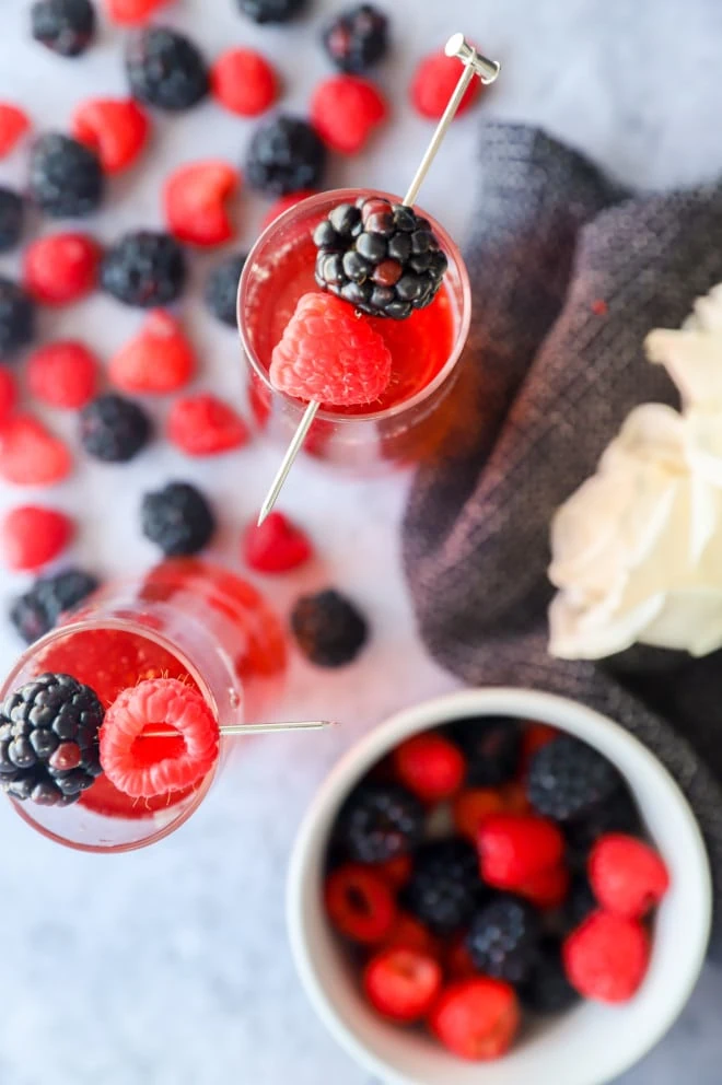 Overhead shot of sparkling rose sangria and berries