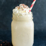 baileys coffee milkshake in mason jar with whipped cream and chocolate shavings