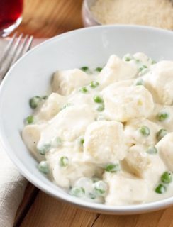 Ricotta Gnocchi with Lemon Cream Sauce & Peas | cakenknife.com