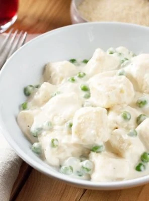 Ricotta Gnocchi with Lemon Cream Sauce & Peas | cakenknife.com