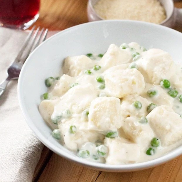 Ricotta Gnocchi with Lemon Cream Sauce & Peas | cakenknife.com