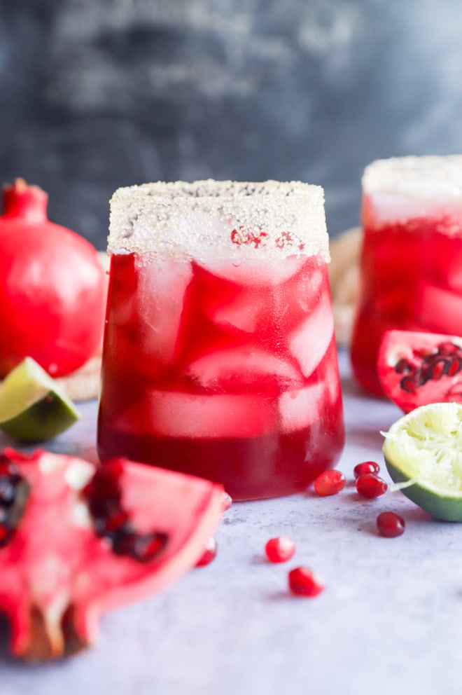 Side photo of pomegranate margarita in glasses