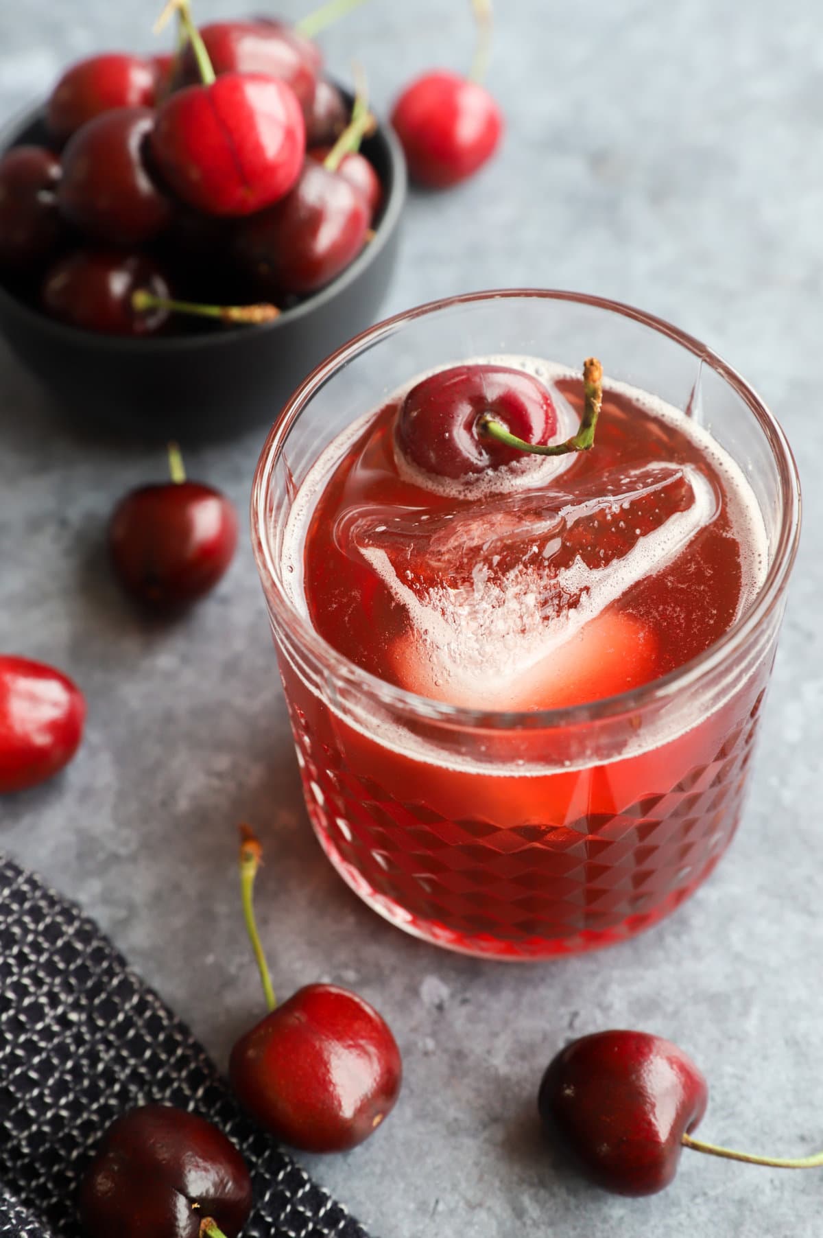 Fresh cherry cocktail in glass with fruit image