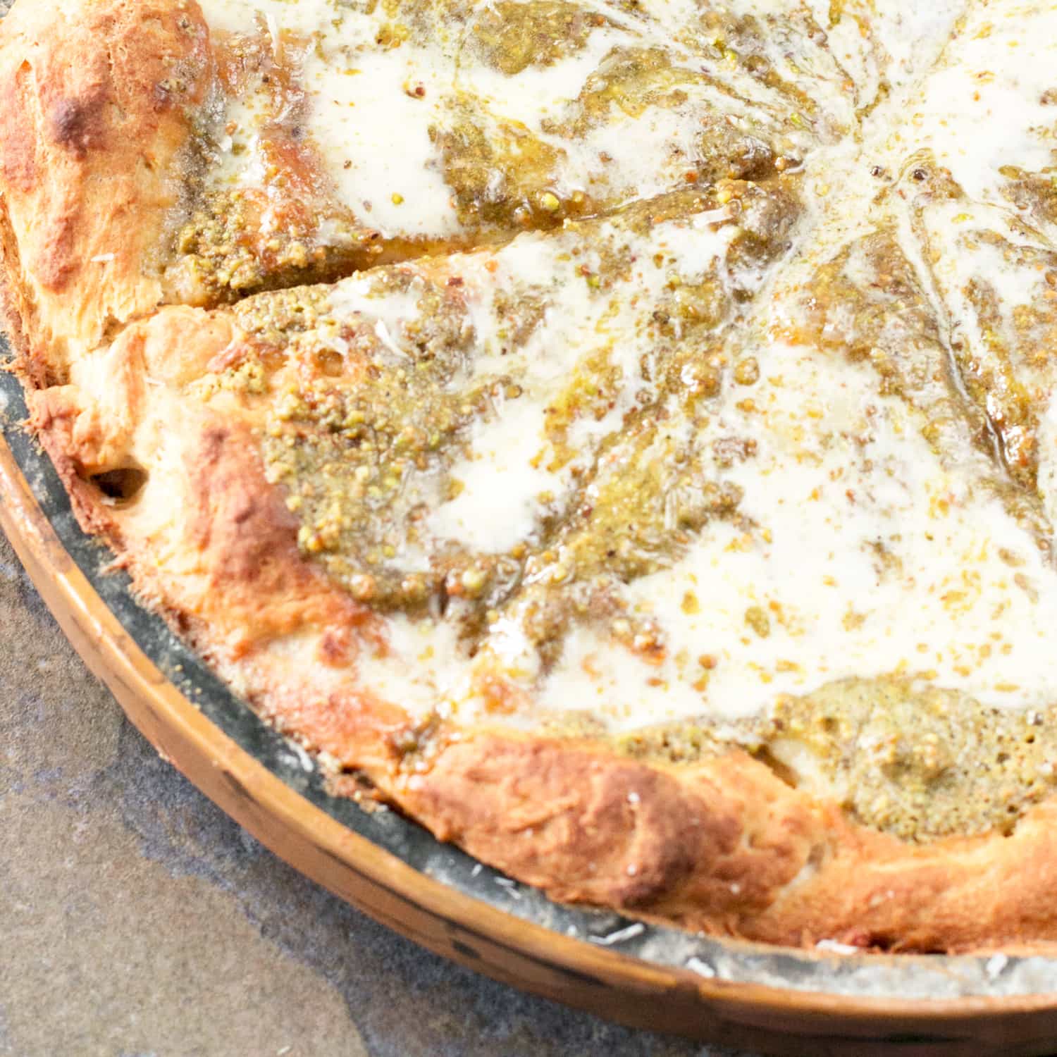 Pistachio Pesto Pizza with Crème Fraîche and Roasted Garlic (PLUS a KitchenAid Food Processor Giveaway!) | cakenknife.com