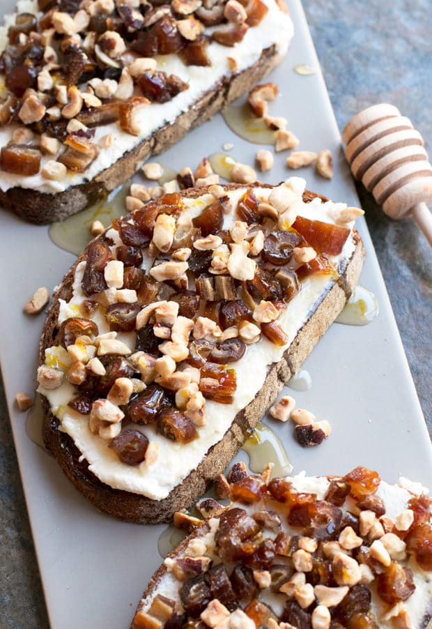 Ricotta, Date & Hazelnut Tartine with Spiced Rum Honey | cakenknife.com