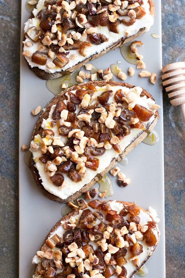 Ricotta, Date & Hazelnut Tartine with Spiced Rum Honey | cakenknife.com