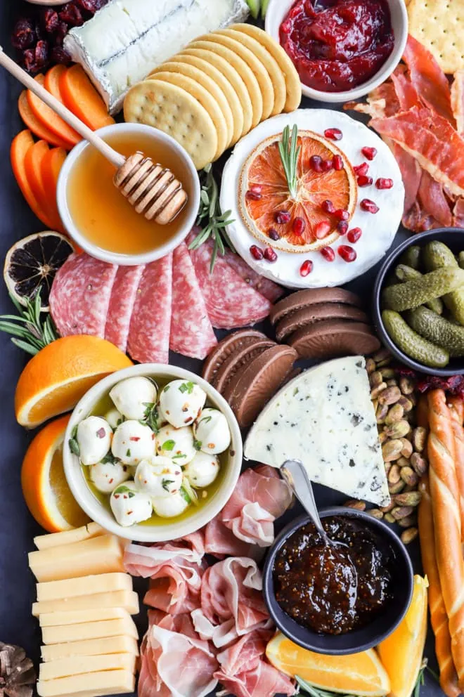 image of marinated mozzarella balls in bowl with other appetizers