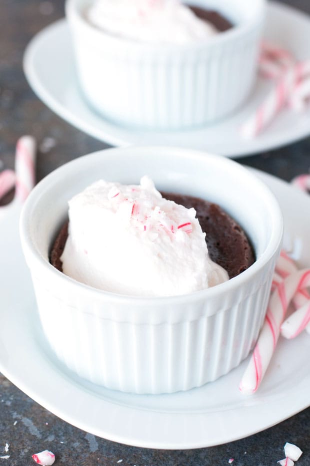 Gooey Dark Chocolate Cakes with Peppermint Crunch Whipped Cream | cakenknife.com