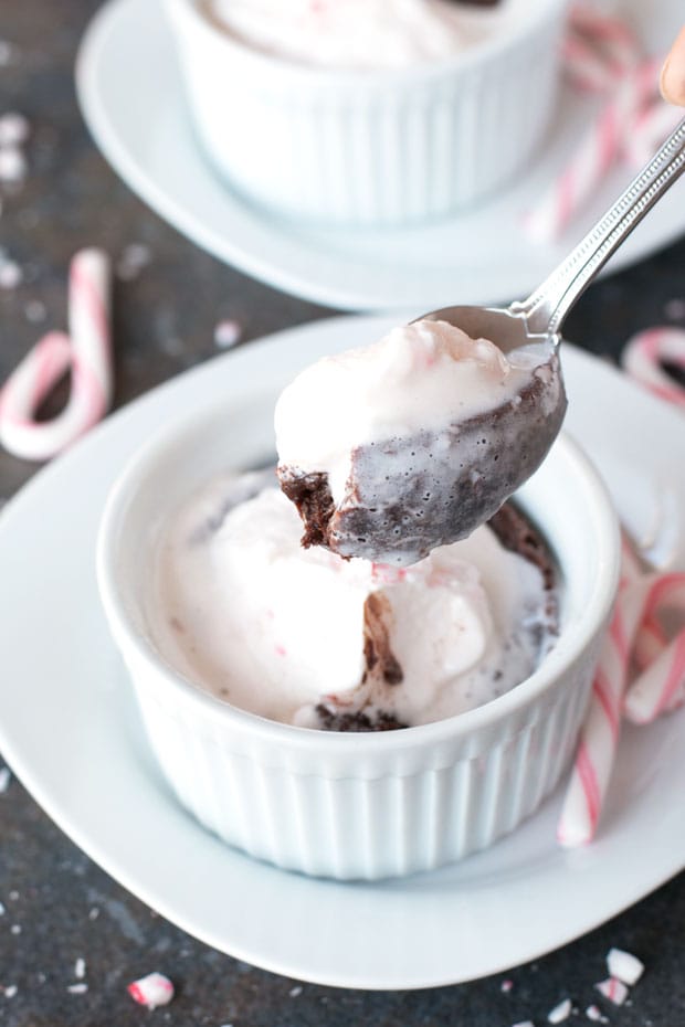 Gooey Dark Chocolate Cakes with Peppermint Crunch Whipped Cream | cakenknife.com