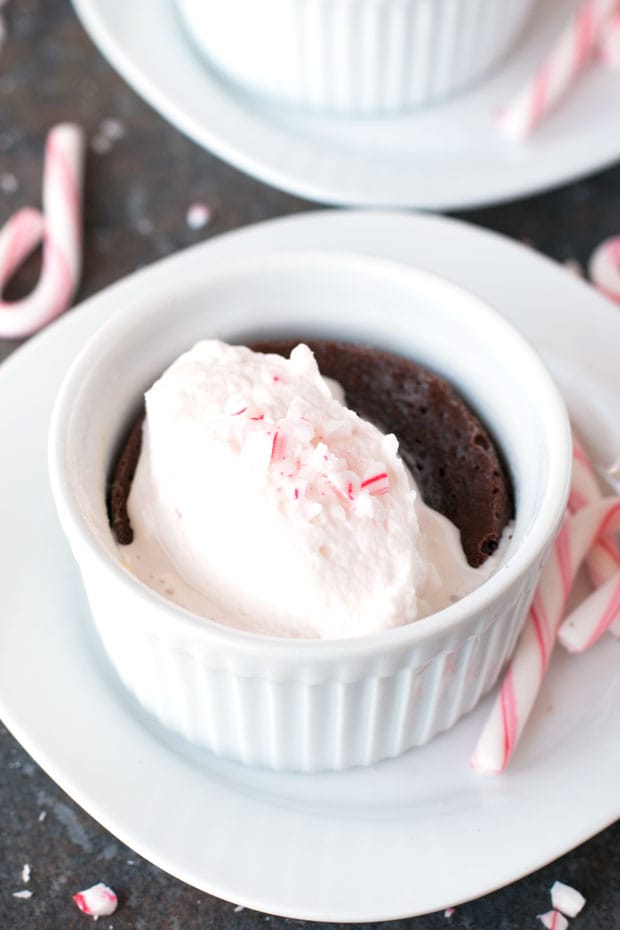 Gooey Dark Chocolate Cakes with Peppermint Crunch Whipped Cream | cakenknife.com