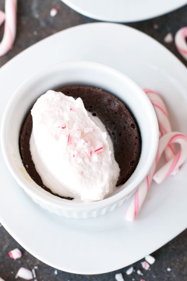 Gooey Dark Chocolate Cakes with Peppermint Crunch Whipped Cream | cakenknife.com