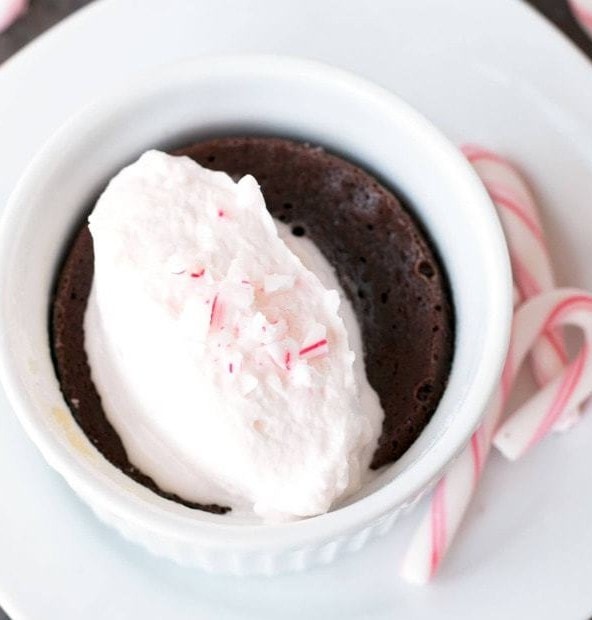 Gooey Dark Chocolate Cakes with Peppermint Crunch Whipped Cream | cakenknife.com