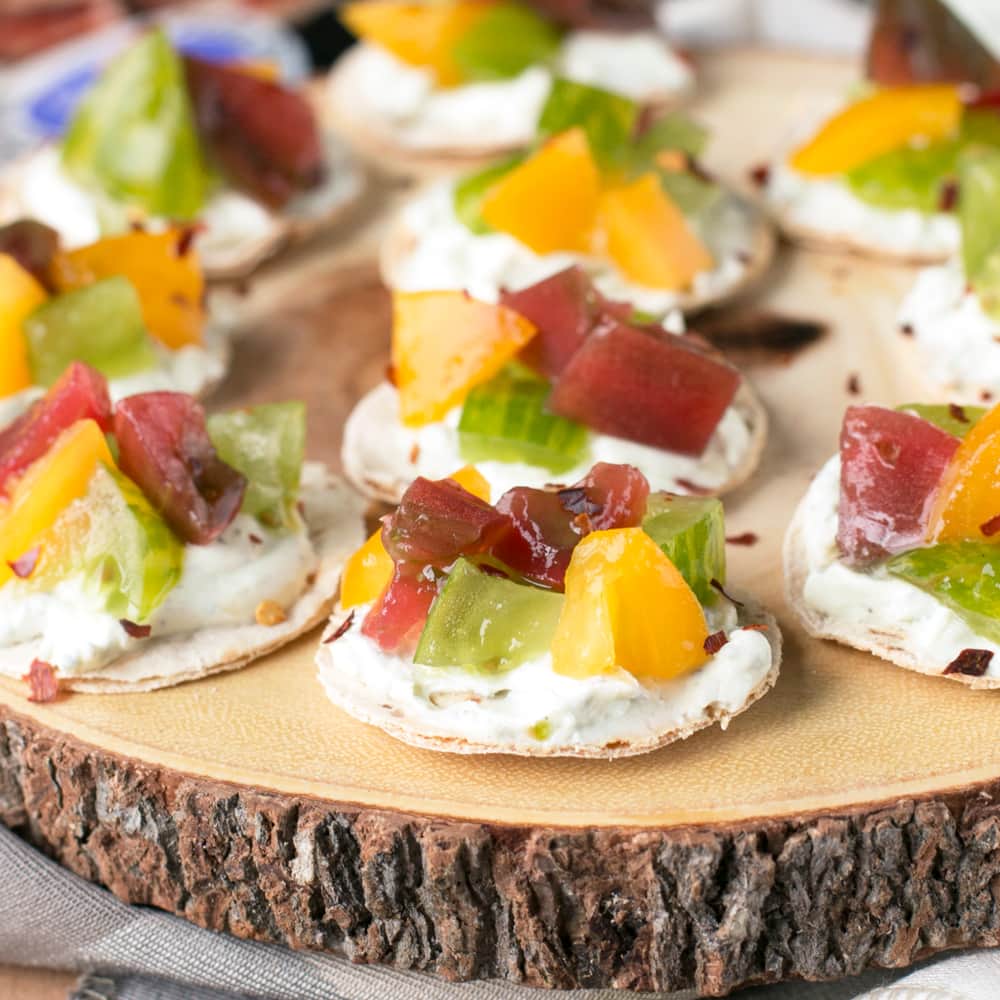 Spicy Heirloom Tomato Whipped Herb Goat Cheese Bites | cakenknife.com #appetizer #cheese