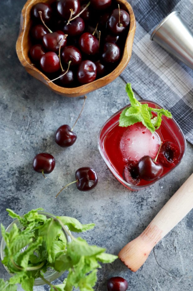 Photo of cherries and mint cocktail