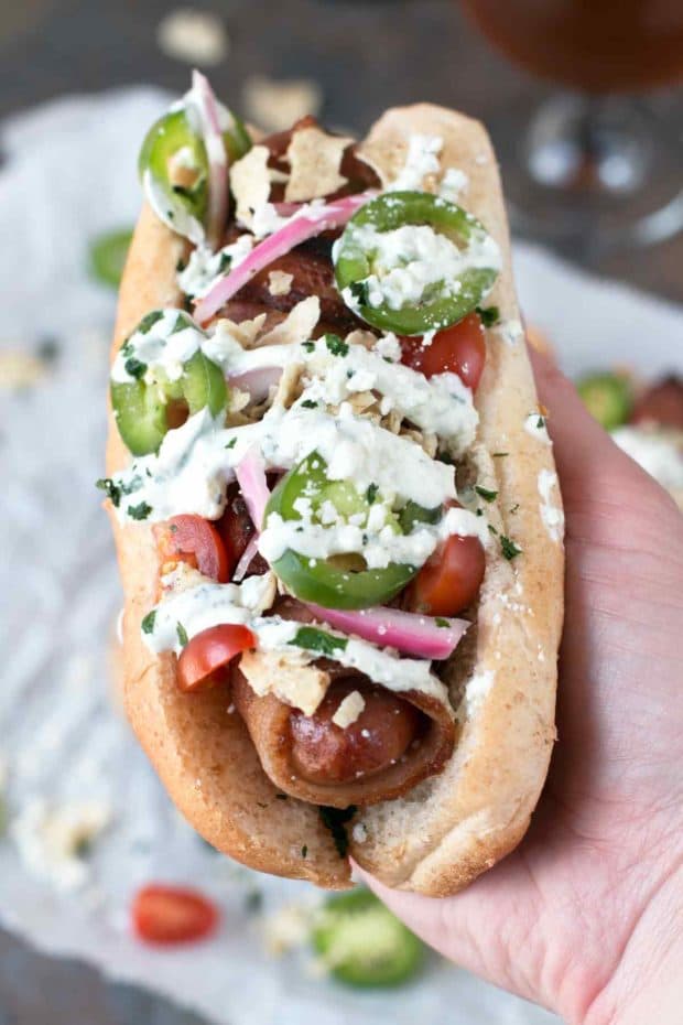 Spicy Bacon-Wrapped Bratwurst with Homemade Pickled Red Onions | cakenknife.com #bratwurst #hotdog #summer #bacon