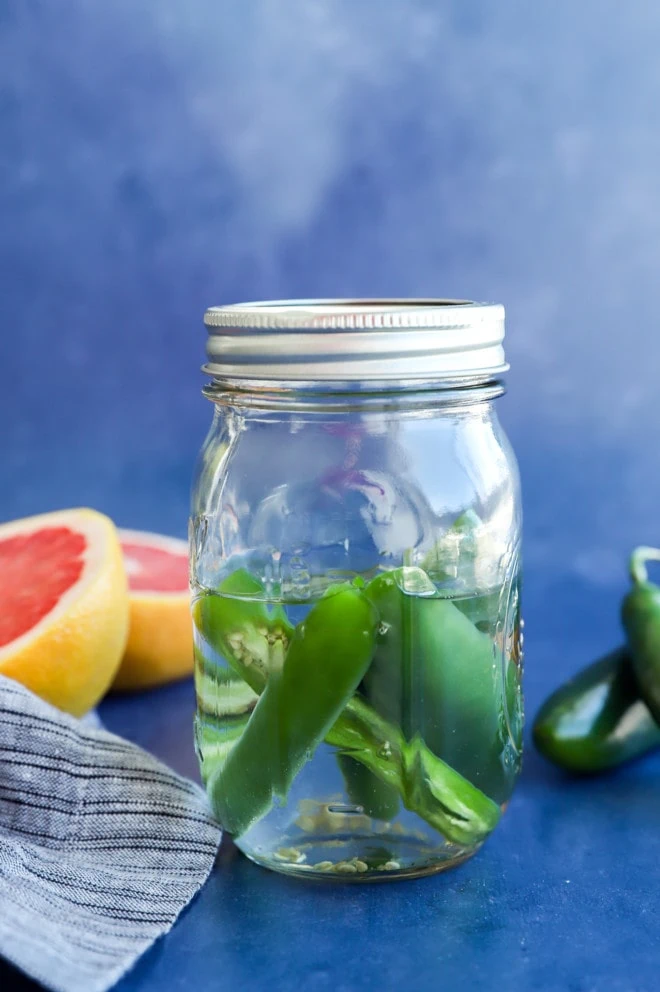 vodka and gin infusing with chili peppers