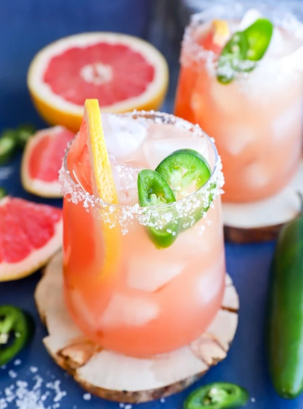 spicy grapefruit drink in glasses with salt rims